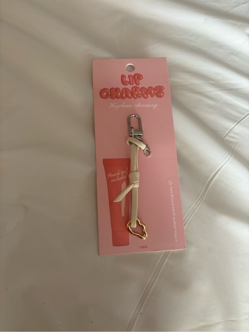 Cream Leather Knot Keychain with Gold Heart Charm